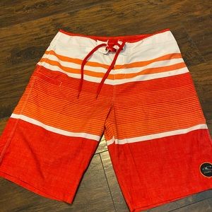Orange O’Neill board shorts